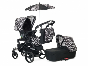 Die Zubehör-Pakete beinhalten ein Verdeck für Wanne und Sitzteil, eine Sitzauflage, Sonnenschirm, Regenschutz und die neue Wickeltasche Mood.